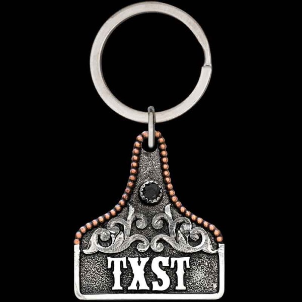 "Our Pure Country Custom Keychain is crafted on a matte German Silver base, finished with our signature antique detailing and Copper bead edge. Customize this keychain by selecting your desired stone color and adding personalized lettering, custom lo